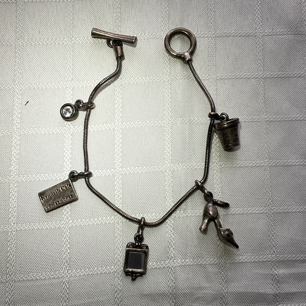 Kenneth Cole Charm Bracelet with Unique Charms
